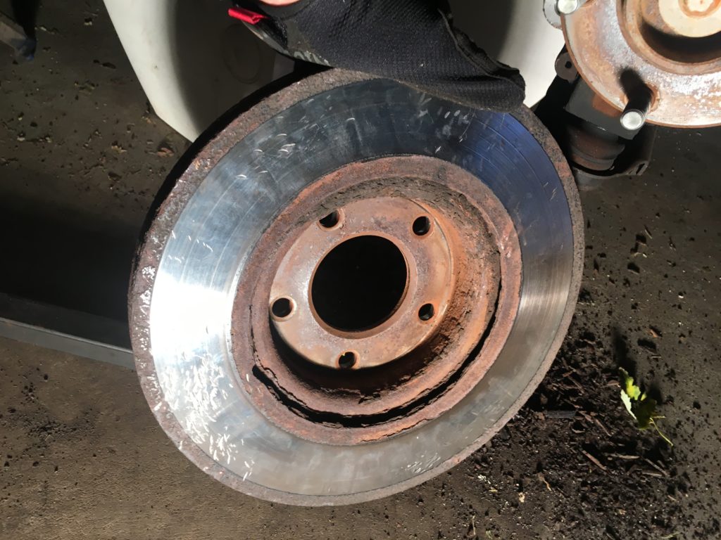 Remove rotor 2004 mazda 3